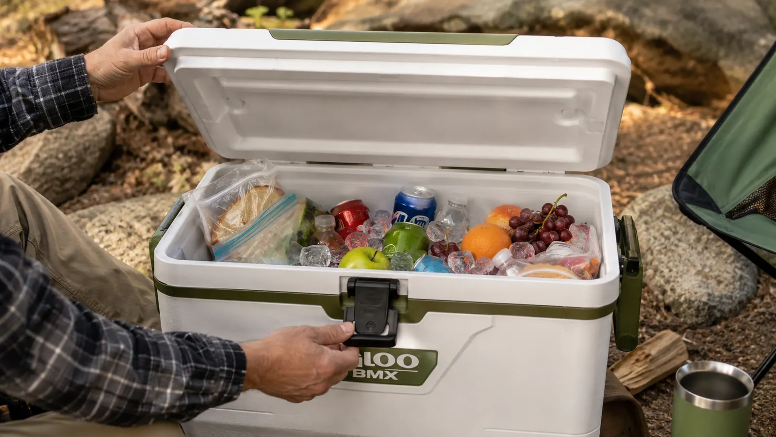 Open Igloo BMX cooler showing cold food and ice still intact on day three of camping